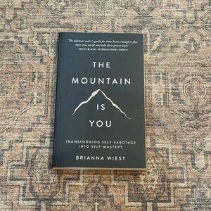 The Mountain Is You by Brianna Wiest — Black Cover with Gold Accent